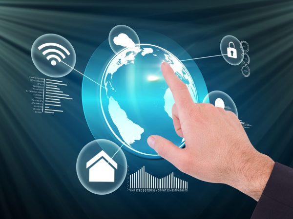 composite of hand pointing at graphics